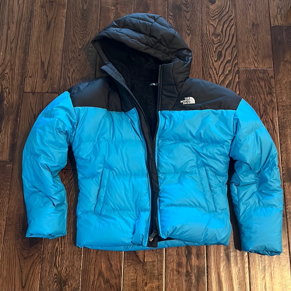 The North face blue and black coat with hood
